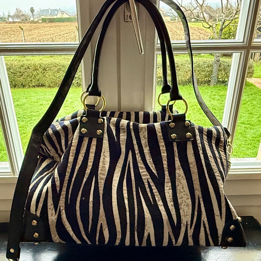 Stylish Zebra Print Duffle Handbag. - image 1